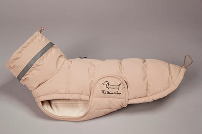 Beige dog coat with a brand logo on a gray background